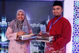 Juara qari berlatih al-Quran sambil memandu