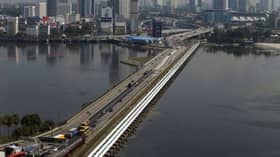 Singapore, Malaysia to transfer symptomatic travellers back across checkpoints