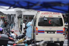 Covid-19 patients urged to stay calm while awaiting trip to hospital