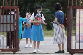 School management allowed to check teacher's vaccination certificate