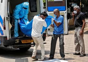 India's coronavirus cases cross 200,000, peak still weeks away