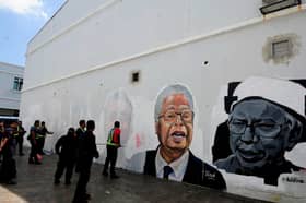 Police have leads on defacing of mural featuring country’s leaders