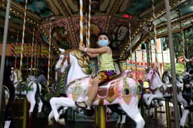 Second wave of coronavirus in Asia prompts fresh lockdowns