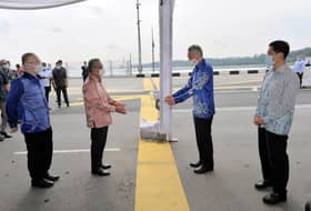 M’sia, S’pore seal RTS agreement, witnessed by two PMs on Johor causeway