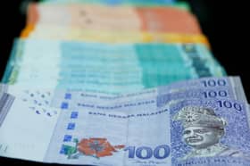 Ringgit slips but manages to hold at 4.12 level versus US dollar
