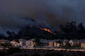 Over 60,000 evacuated as California wildfire rages