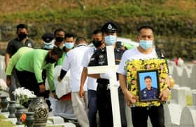 Sombre atmosphere at Sarawak policeman’s funeral