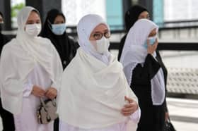 Permaisuri Agong berangkat ke Istiadat Pengebumian Negara Tun Rahah