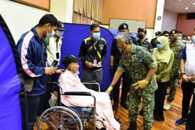 Agong wants authorities to ensure aid reaches flood victims in rural areas