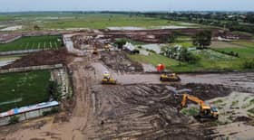 Indonesian capital expands graveyards as Covid death toll mounts