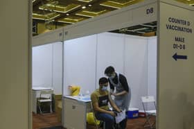 Wider vaccination and herd immunity are vital to Malaysia’s economic recovery