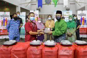 Frontliners, patients at Serdang quarantine centre receive Aidilfitri food