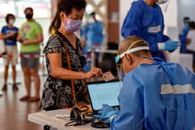 Singapore intensifies testing in response to Covid-19 infection wave in the community