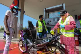 ADN Batu Tiga belanja minyak percuma untuk 200 motosikal