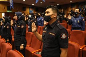 MBSA personnel raise hands to recite Corruption-Free Pledge