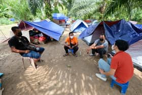 Floods: Orang Asli residents continue staying in tents over fear of second wave