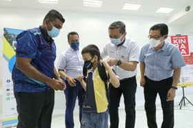 64 anak yatim, murid susah sekitar Kinrara terima kelengkapan sekolah