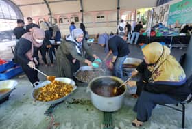 PKPS conducts gotong-royong to cook food for flood victims