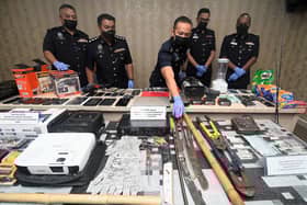 Ops Sarang: 29 men including drug pusher nabbed in oil palm plantation