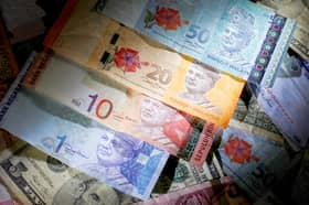 Ringgit ends lower against US dollar