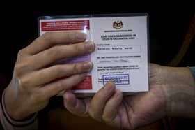 64.9 pct of adult population in Malaysia given Covid-19 booster dose