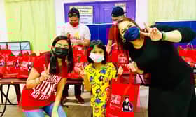 50 pupils receive school supplies from Kampung Tunku rep, NGOs