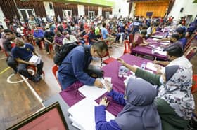 Hundreds of flood victims qualifying for RM1,000 aid yet to claim it