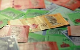 Ringgit holds steady to end higher versus US dollar ahead of US Fed minutes