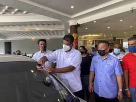 Selangor contributes nearly RM50,000 to Socso for e-hailing riders’ protection