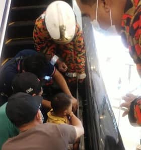 Toddler endures pain for almost one hour after foot gets stuck in escalator