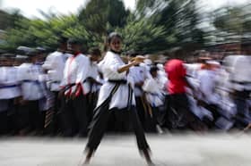 Bangun seawal 3 pagi, ibu teruja bawa anak sertai kejohanan seni bela diri