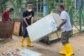 Team Selangor volunteers help clean flood victims homes in Hulu Selangor