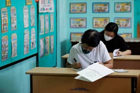 Prospect of Marcos revival looms as voting underway in Philippines