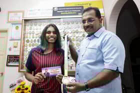 Commonwealth Games gold medalist M. Thinaah recieves special contribution from Sentosa