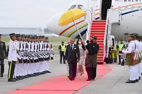 King, Queen arrive home from UK