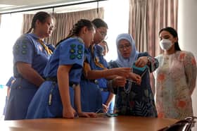 Queen donates S$15,000 to Girl Guides Singapore