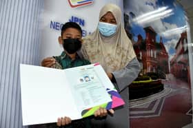 Senior citizen's adopted son gets citizenship after eight-year wait