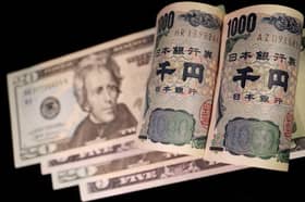 US dollar skids as yen soars after BOJ's surprise move, gold rises