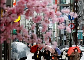 Japan reopens to tourists with shuttered souvenir shops, hotel staff shortage