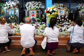 Victims of Thailand massacre laid to rest amid outpouring of grief