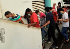 Seven men charged with committing mischief over upturned car in Pasir Gudang