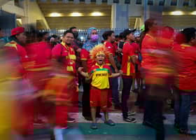 Football fans descend on National Stadium for Malaysia Cup final