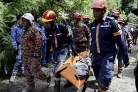 Mangsa tanah runtuh mungkin lebih 94 orang, kata menteri