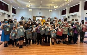 Subang Jaya rep hands over school aid to 400 students