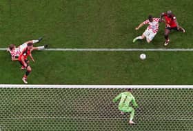 Croatia cling on to reach last 16 and send Belgium packing