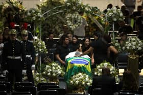 Brazil bids farewell to 'king of football' Pele with 24-hour wake