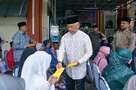 King presents donation to 50 asnaf in Langkawi