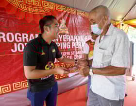 Over 300 Sungai Tua residents receive Chinese New Year shopping vouchers