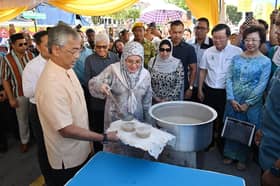 King, Queen visit Tanjung Tokong Ramadan bazaar
