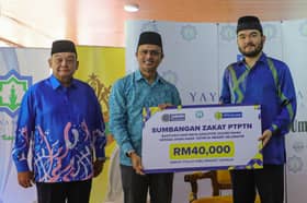 900 anak yatim seliaan Yide terima bantuan sekolah, tabung simpanan pendidikan